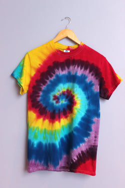 Vibrant tie dye t-shirt swirled with a multitude of colors including purples, blues, reds and yellow.